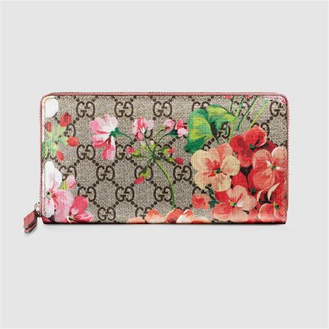 gucci supreme bloom wallet|Gucci zippy wallet.